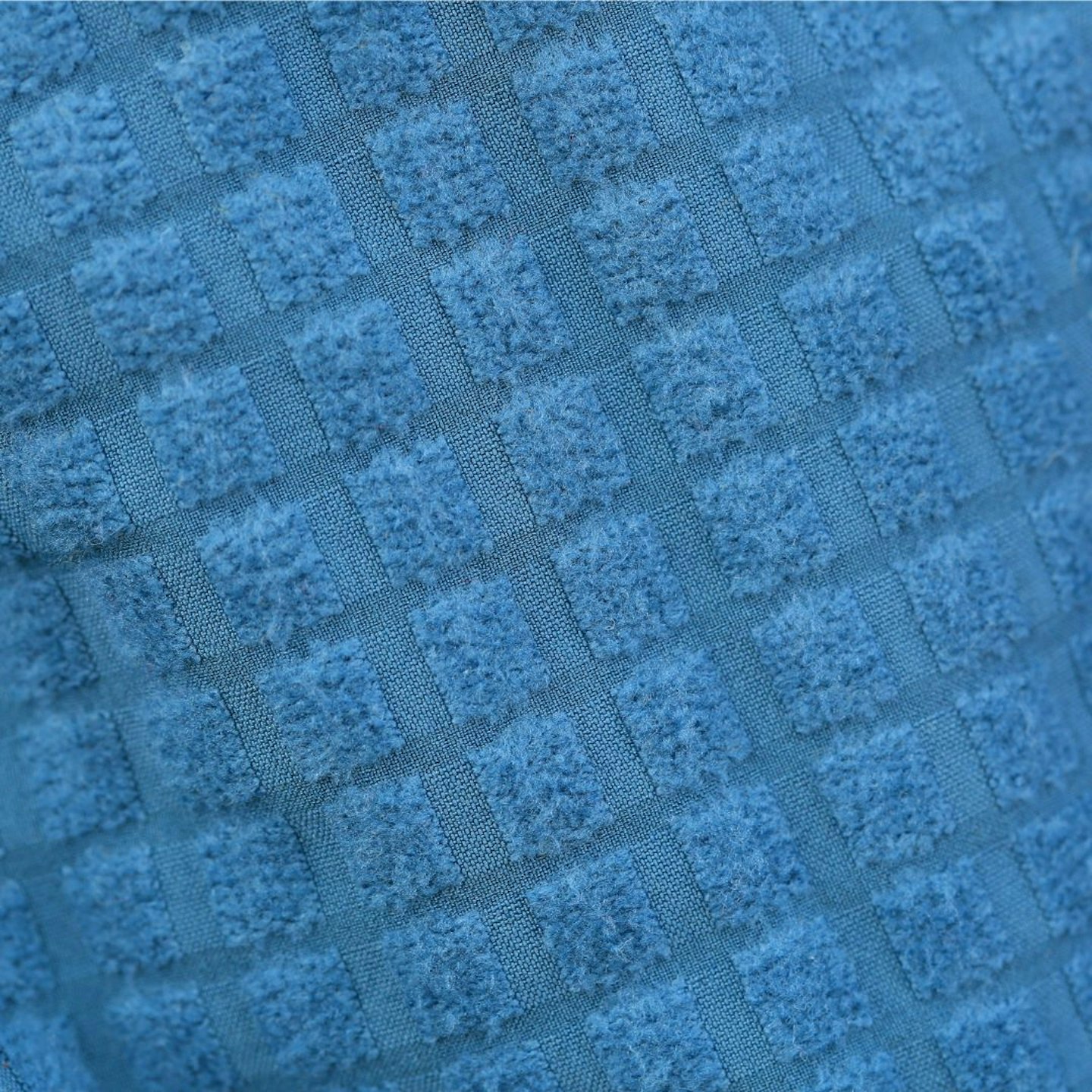 Closeup of Black Diamond Coefficient Storm Hoody grid backer fabric