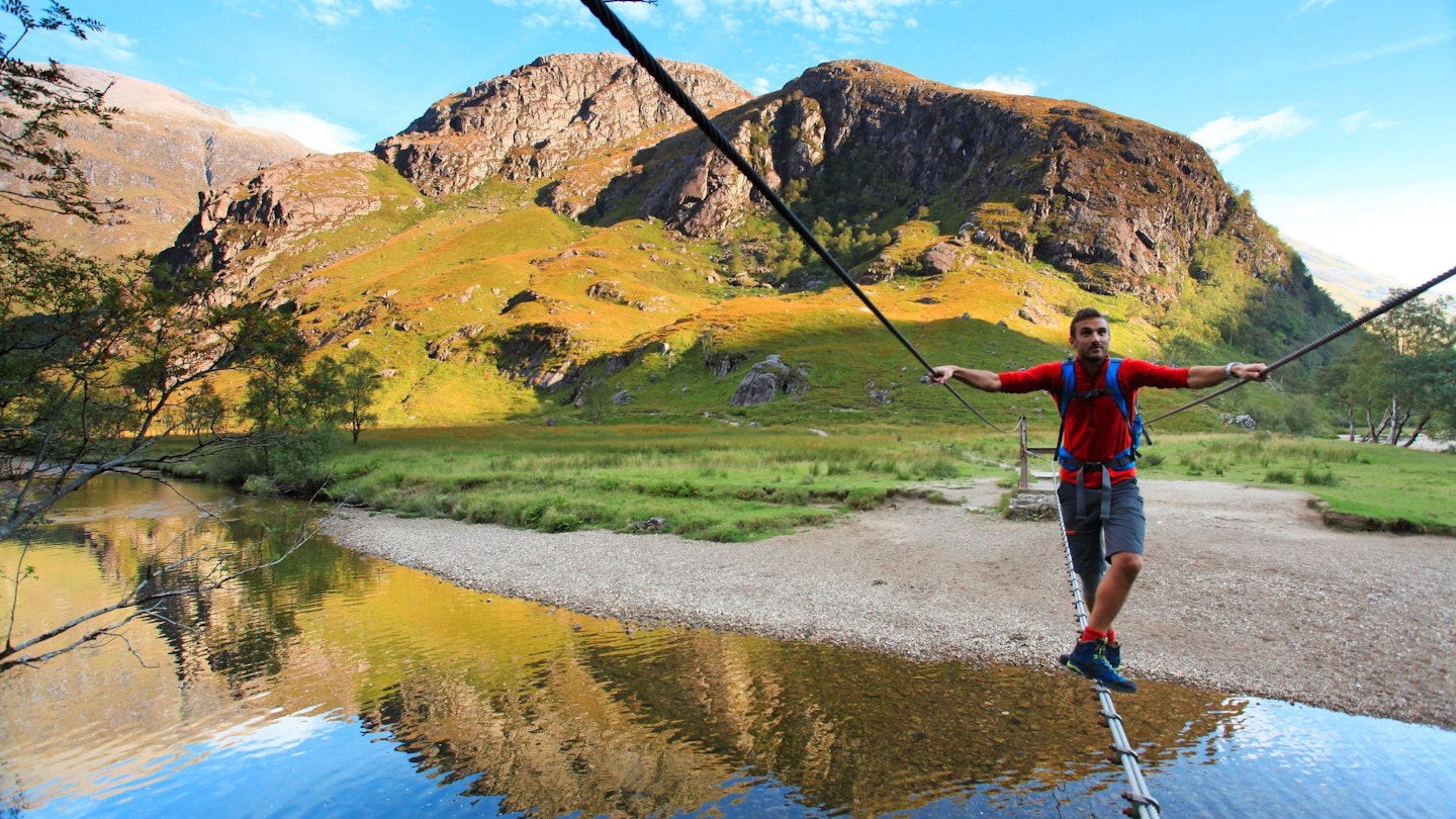 Crossing the Water of Nevis Ring of Steall Glen Nevis Scotland