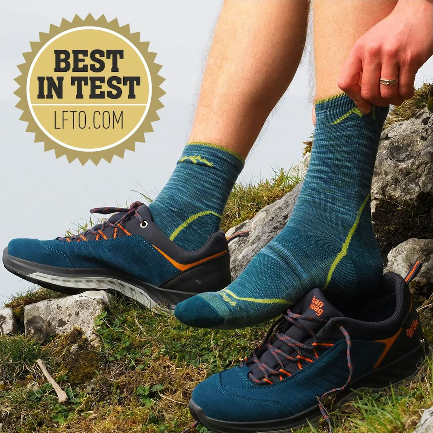 Hiker putting on Darn Tough Light Hiker Micro Crew Lightweight With Cushion socks