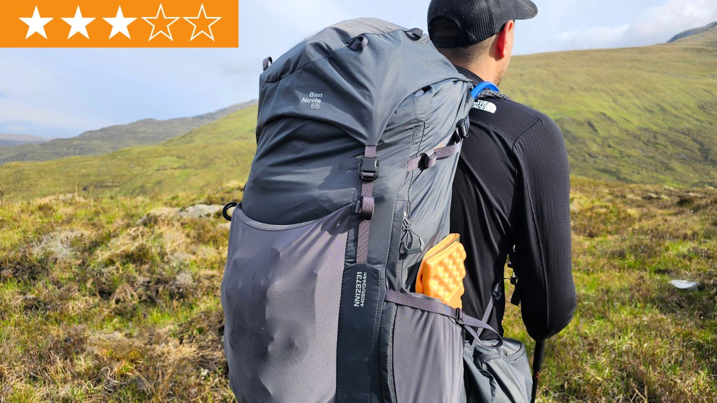 Hiker wearing Highlander Ben Nevis 65 pack with LFTO star ratings