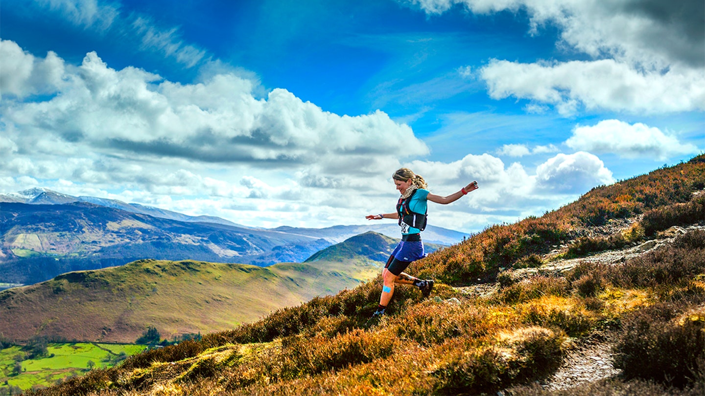 women running down a mountain