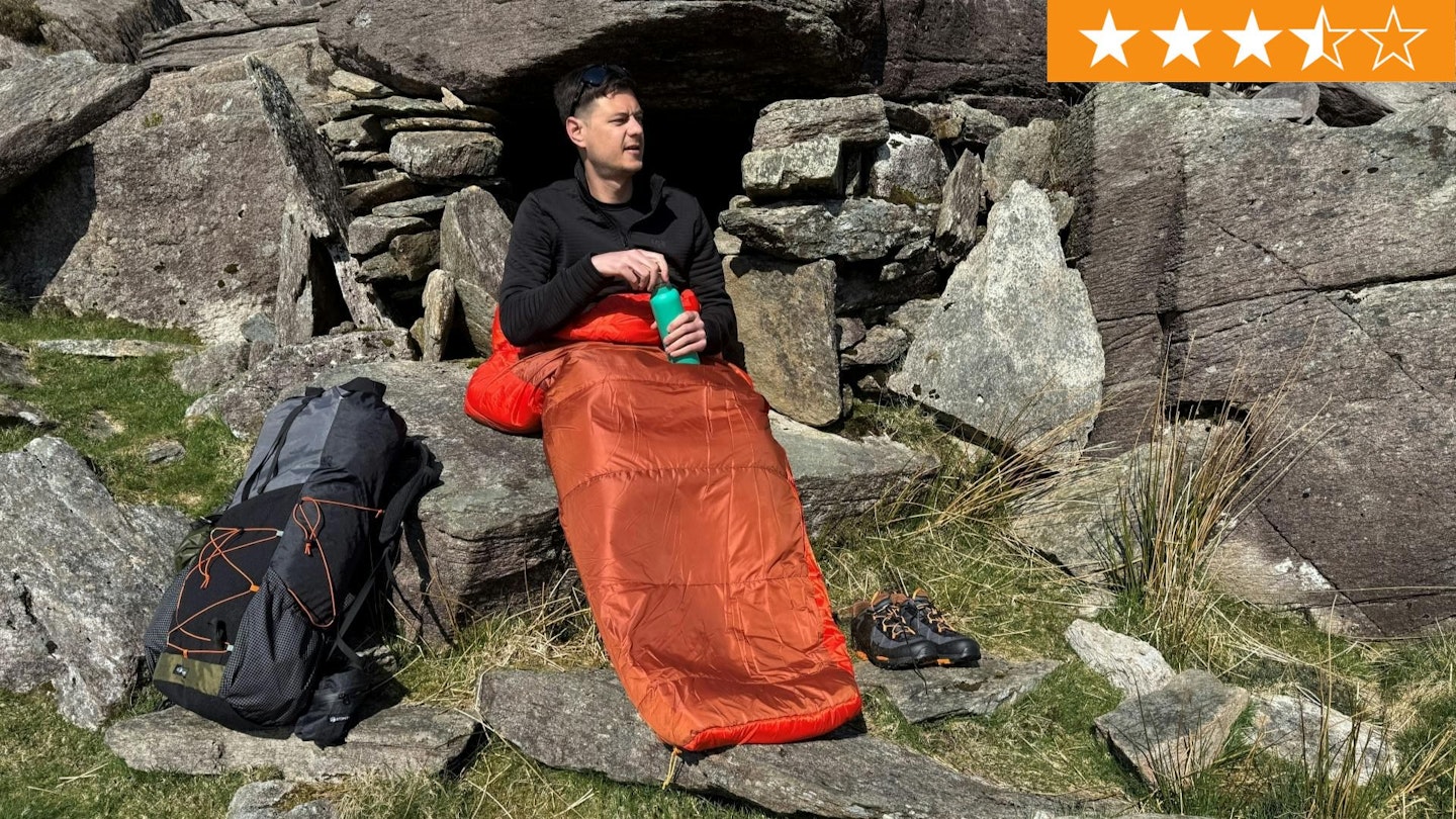 Matt Jones sits in Sea to summit hamelin synthetic sleeping bag