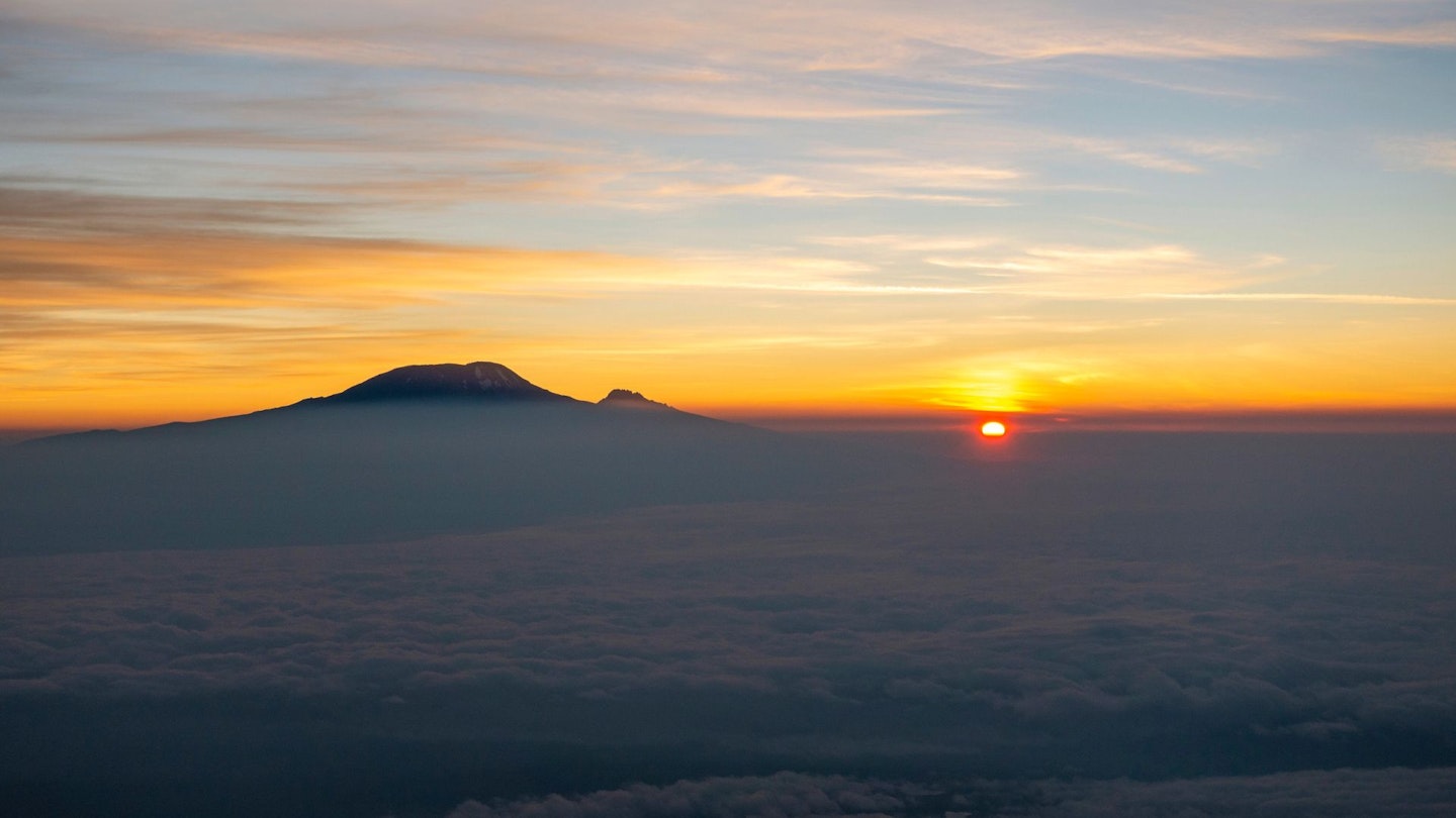 Watching the sunrise on Mount Meru