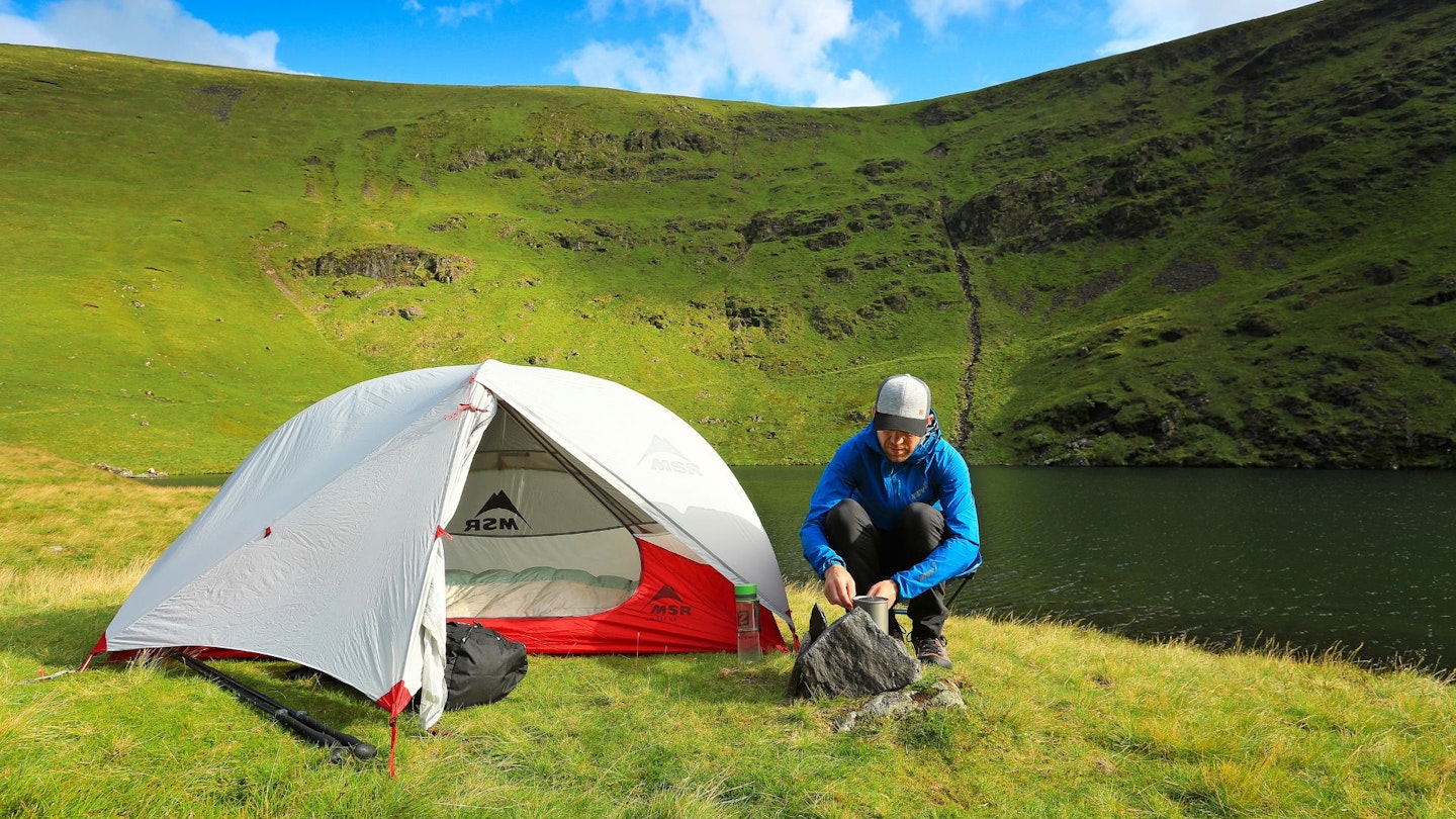 Wild camping by a mountain tarn
